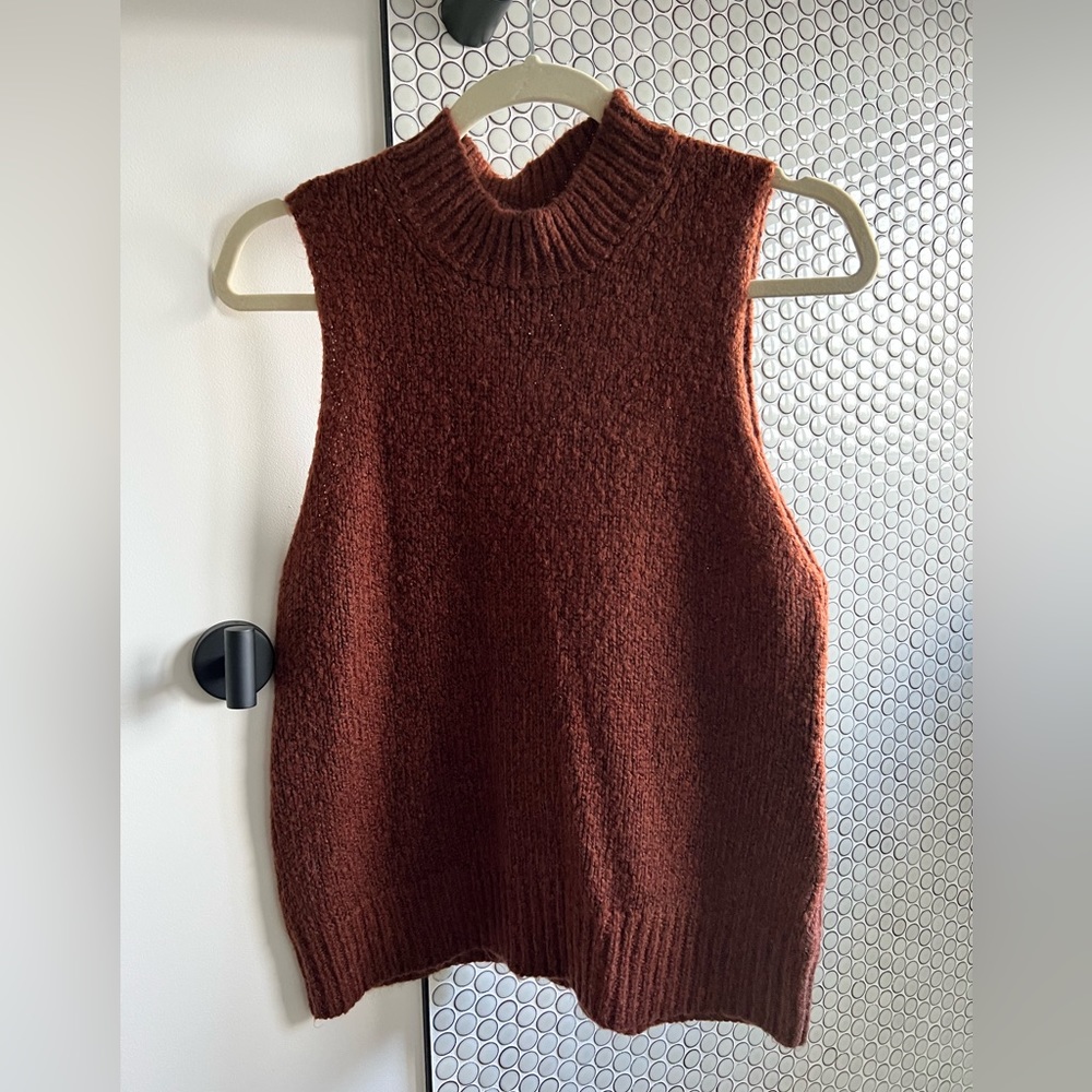 Knit tank/vest. Perfect for layering or alone. Worn once.